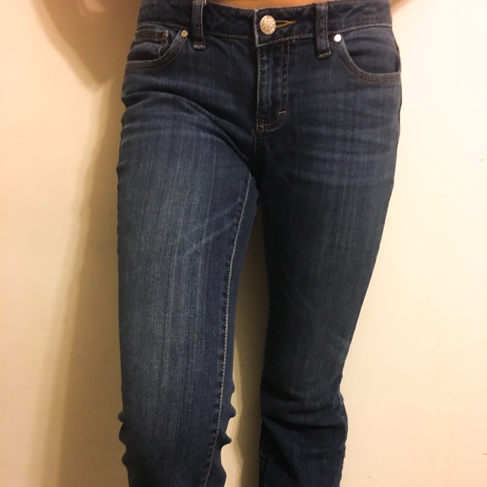 Jennifer Lopez studded button boot cut jeans